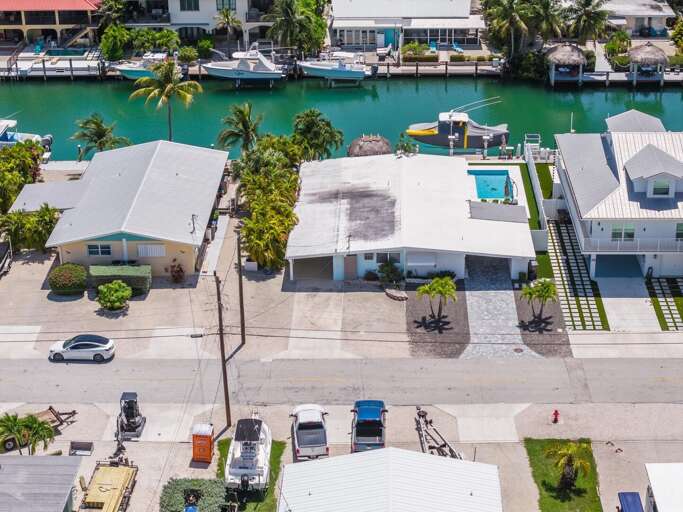 Located in quiet and walkable Key Colony Beach, this waterfront rental is a great home base for boating, fishing, relaxing, and enjoying the best of Marathon FL.