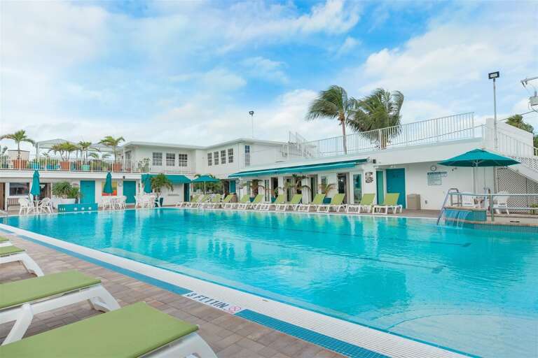 Relax poolside at the Key Colony Beach Cabana Club, where guests can enjoy a private club atmosphere, beach access, and resort-style amenities during their Florida Keys stay.