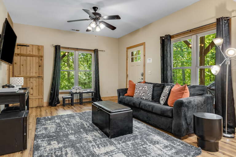 Lower Living Area w/ Patio & Hot Tub Access