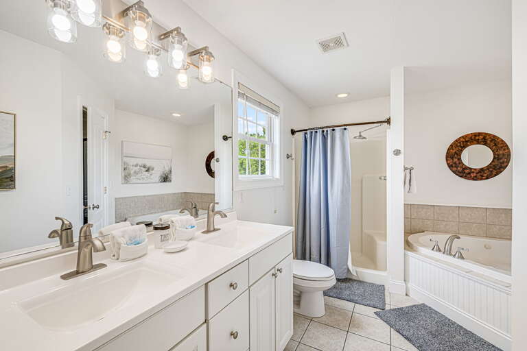 Bedroom One - Attached Bath w/ Dual Vanity & Jetted Tub