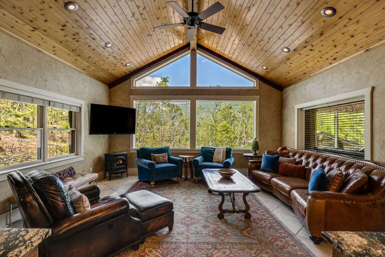 Living Area w/ Gas Stove and Smart TV Living Area w/ Gas Stove and Smart TV