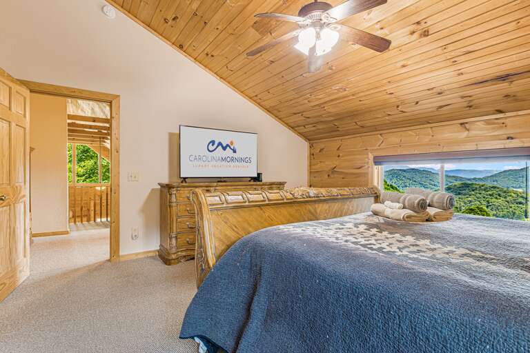 Main Suite Bedroom Four with TV & Mountain Views