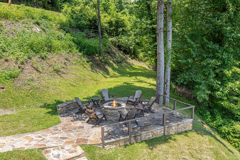 Deck w/ View Of Fire Pit & Wooded Surroundings