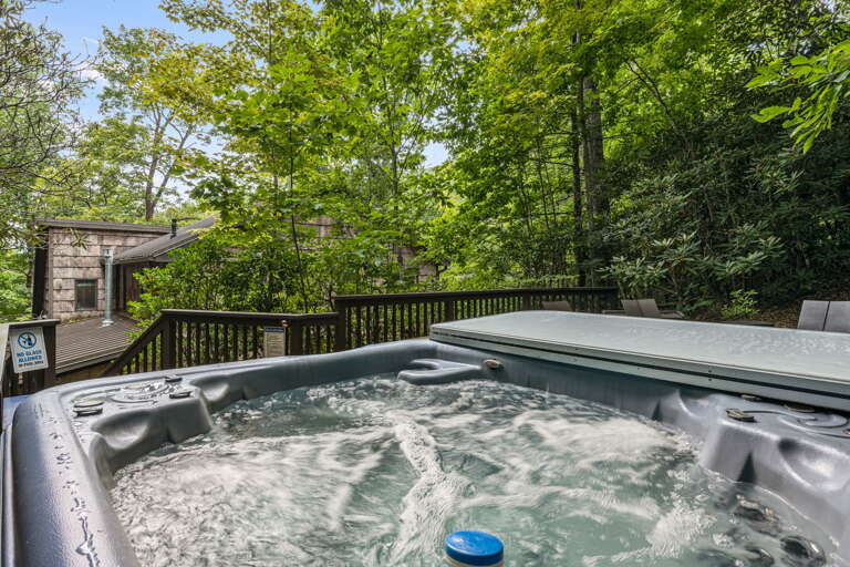 Sink into your private hot tub surrounded by lush forest, where warm bubbles and cool mountain breezes melt all your cares away.