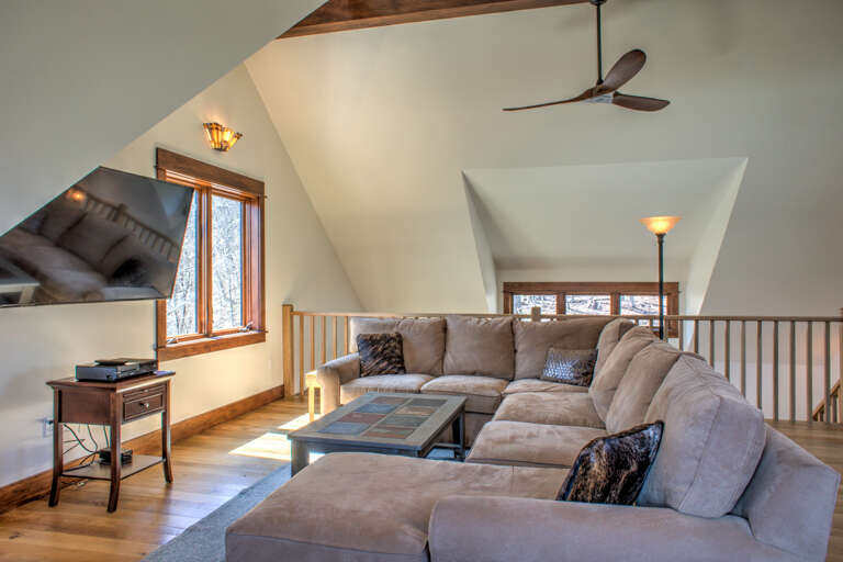 Loft Area w/ Seating & TV Loft Area w/ Seating & TV