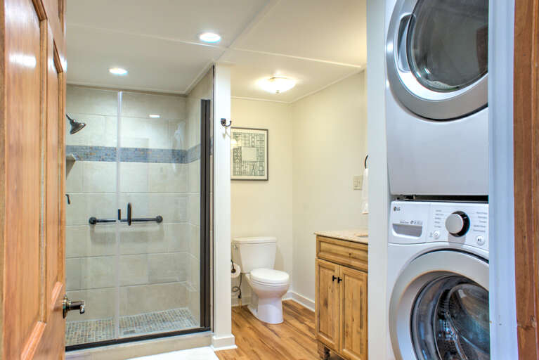 Main Level - Shared Shower Bath & Laundry Area