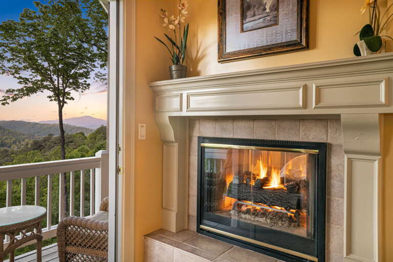 Main Suite/Bedroom One - Gas Fireplace & Private Balcony Access