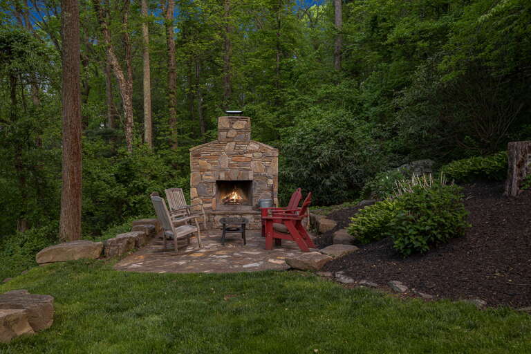 Outdoor Fireplace w/ Stone Patio Sitting Area