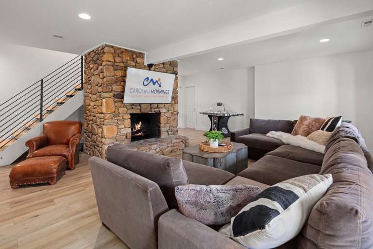Lower Level Living Area - With Seasonal Fireplace