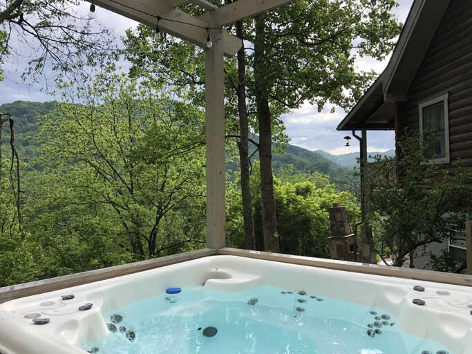 Soak Away the Stress in the Hot Tub while taking in the Mountain Views Soak Away the Stress in the Hot Tub while taking in the Mountain Views