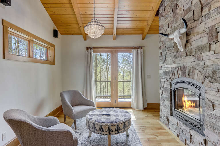 Main Suite/Bedroom 1 - Seating Area with Deck Access