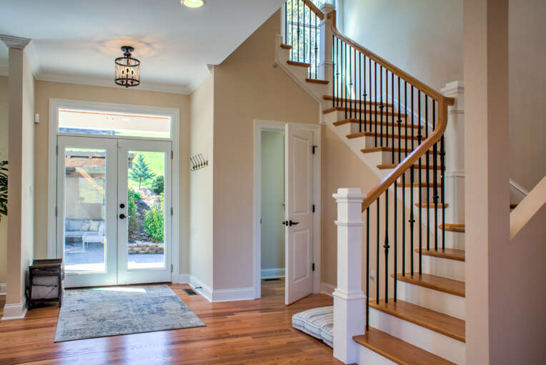 Half Bath and Stairs to Upper Level