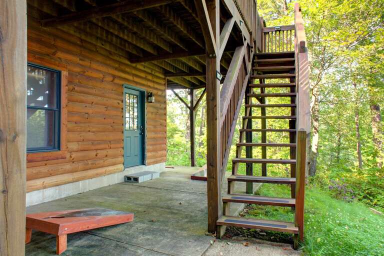 Corn Hole and Stairs to Upper Level Deck Area