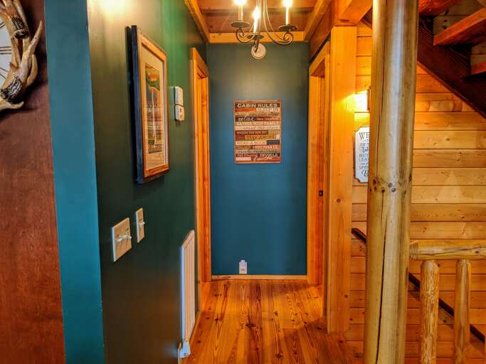 Hallway to Main Level Bedrooms, Baths and Lower Level Stairs