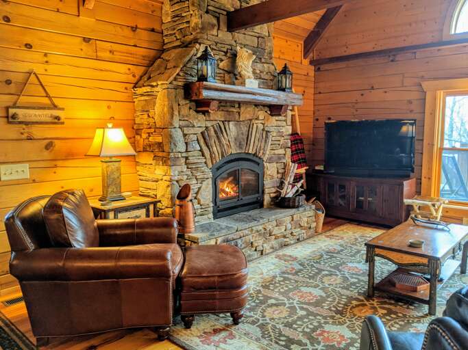 Living Area with Stone Gas Fireplace