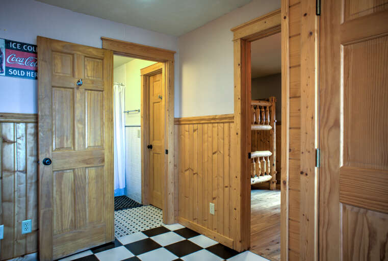 Mezzanine Level - Shared Full Bath in Hallway & Bedroom Three