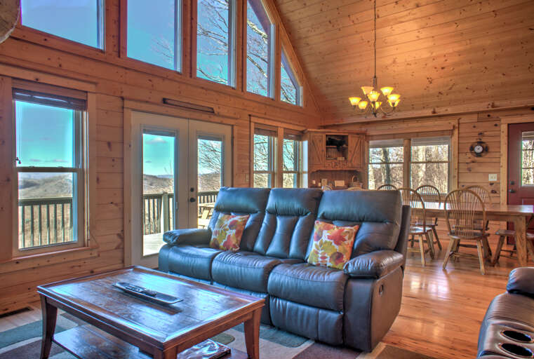 Living Area w/ Deck Access Living Area w/ Deck Access