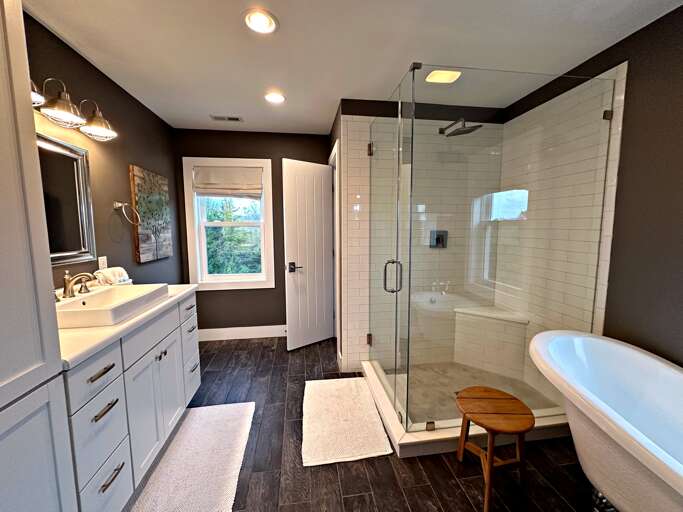 Main Suite/Bedroom One - Attached Full Bath w/ Soaking Tub