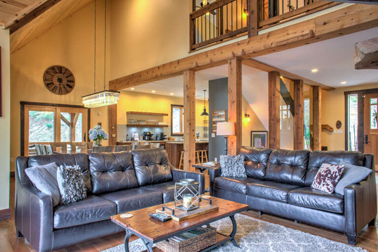 Living Area w/ Luxury Furnishings & Deck Access Living Area w/ Luxury Furnishings & Deck Access