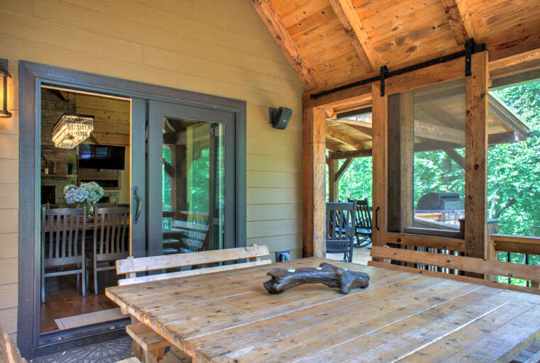 Screened-In Deck w/ Outdoor Dining & Access to Grill Area Screened-In Deck w/ Outdoor Dining & Access to Grill Area