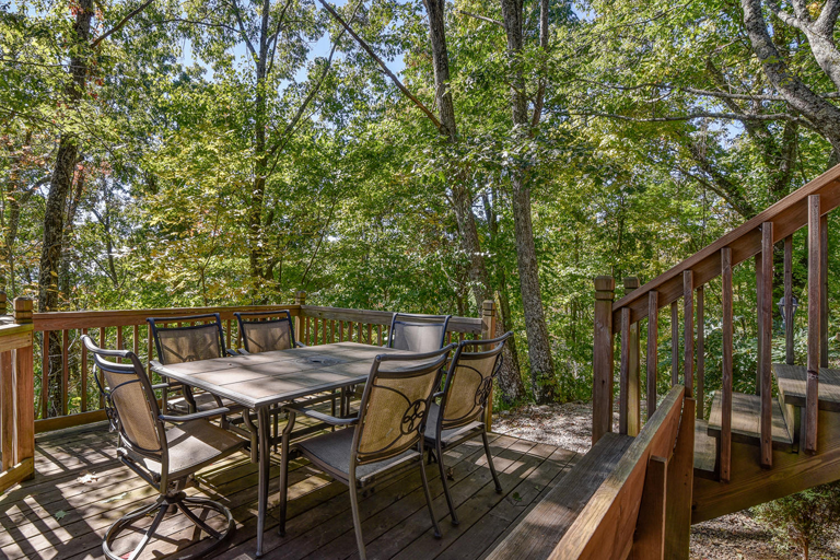 Outdoor Dining Area w/ Wooded Surroundings Outdoor Dining Area w/ Wooded Surroundings