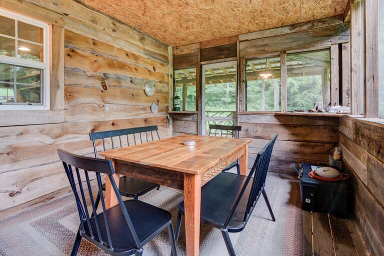 Dining Area on Screened Porch Dining Area on Screened Porch