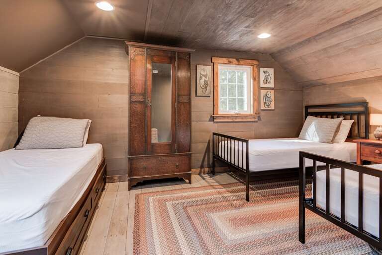 Loft Area with 3 Twin Beds Loft Area with 3 Twin Beds