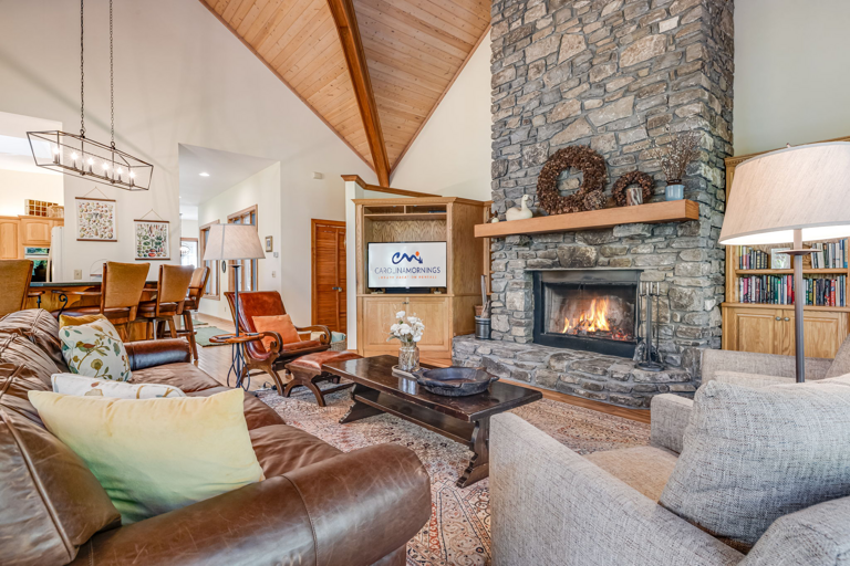 Living Area w/ Wood Burning Fireplace and Smart TV