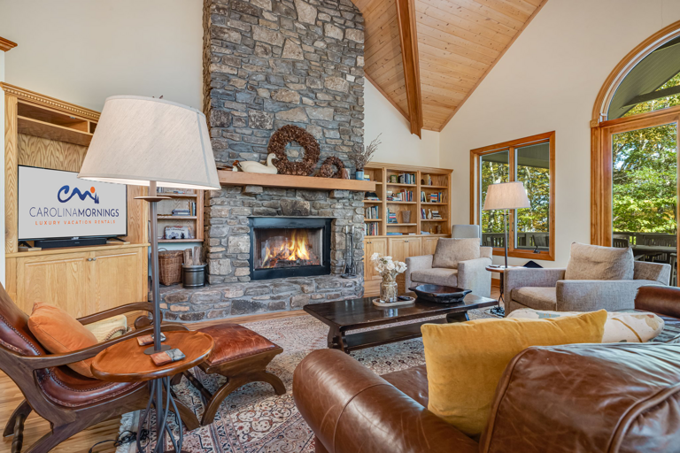 Living Area w/ Wood Burning Fireplace and Smart TV