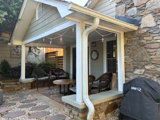 Covered Back Patio Area with Gas Grill