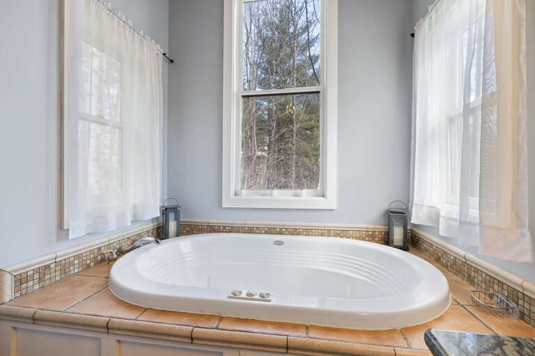 Main Suite/Bedroom Three - Attached Shower Bath & Jacuzzi Tub