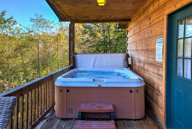 Bubbling and Covered Hot Tub