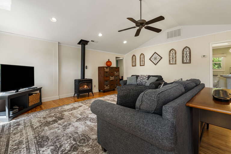 Living Area w/ Smart TV & Wood Stove