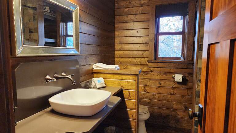 Main Level - Shared Full Bath in Hallway Main Level - Shared Full Bath in Hallway