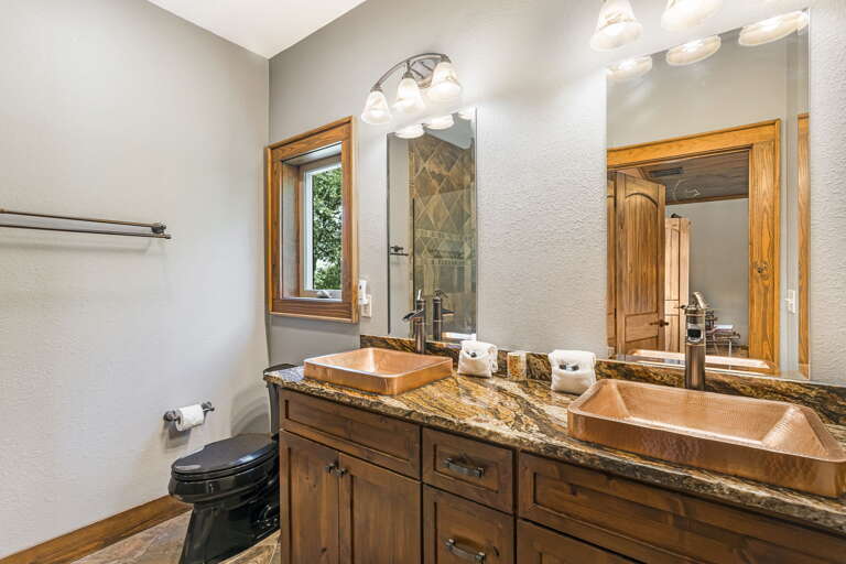 Main Suite/Bedroom Three - Attached Shower Bath w/ Dual Vanities
