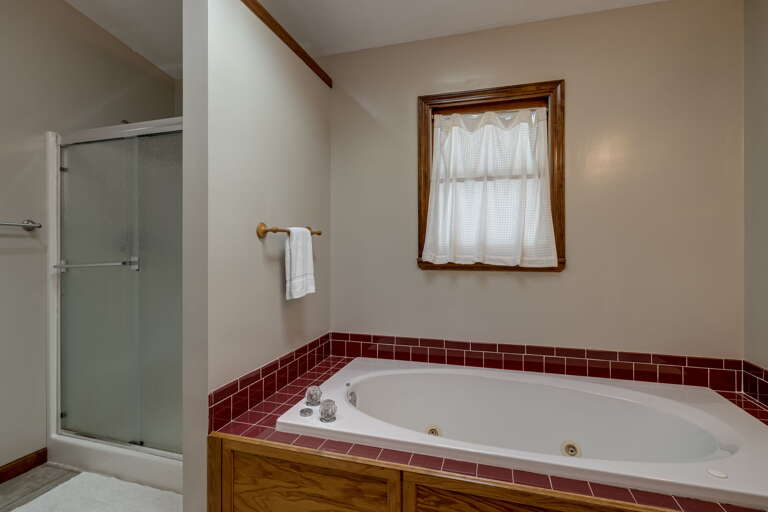 Main Suite/Bedroom One - Full Bath w/ Jetted Tub