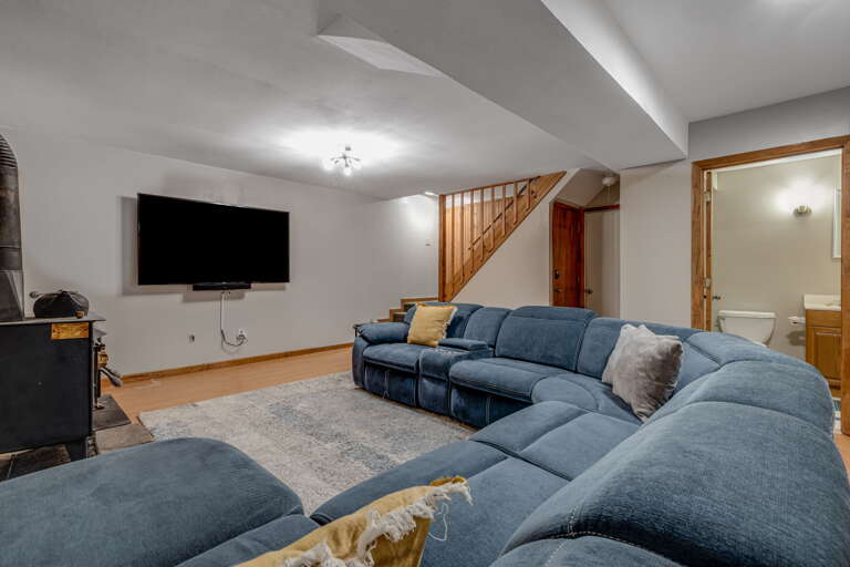 Living Area w/ Smart TV and Wood Stove