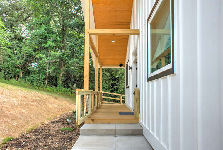 Path to Front Entrance & Fenced-In Yard