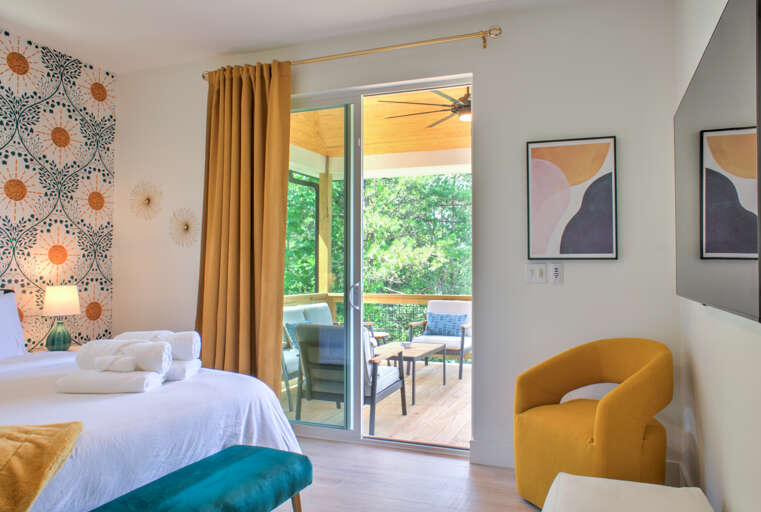 Main Suite/Bedroom One - King Bed w/ Deck Access