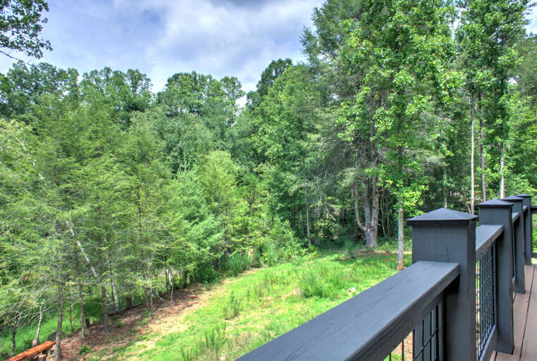 Enjoy the Fresh Mountain Air on the Bedroom's Deck