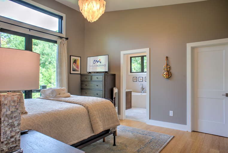 Main Suite/Bedroom One - Queen Bed w/ Smart TV & Attached Full Bath