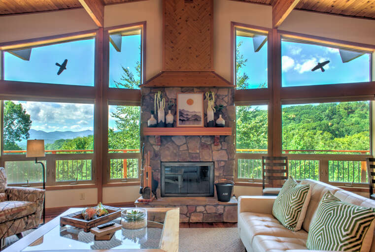 Living Area w/ Wood Burning Stone Fireplace Living Area w/ Wood Burning Stone Fireplace