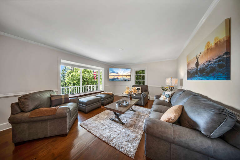 Living Area w/ Smart TV & Natural Lighting