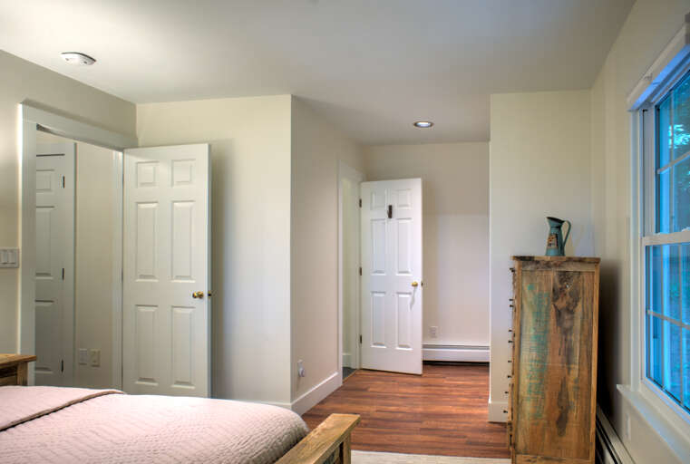 Main Suite/Bedroom Two - Queen Bed w/ Attached Shower Bath