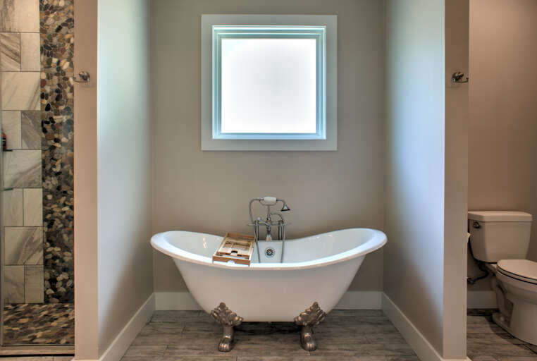 Main Suite/Bedroom One - Attached Full Bath w/ Walk-In Shower & Soaking Tub