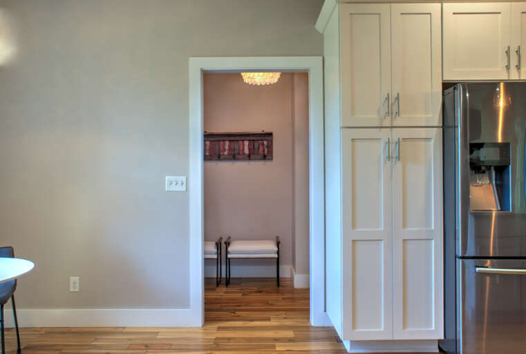 Hallway to Main Suite & Laundry Area