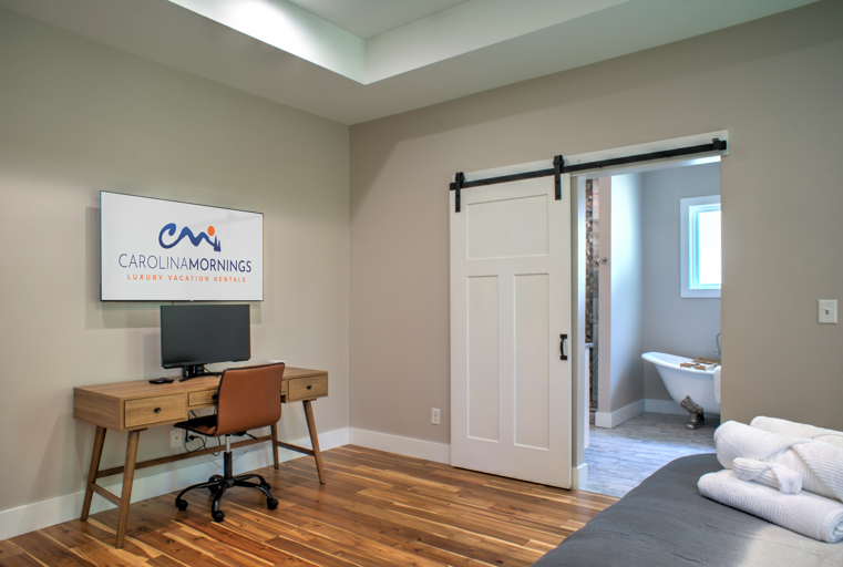 Main Suite/Bedroom One - King Bed w/ Smart TV, Office Space, & Attached Full Bath