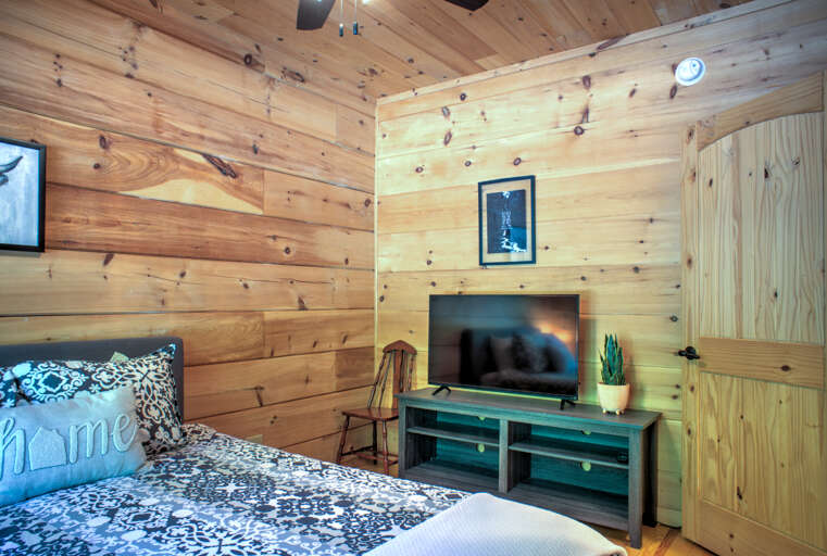 Bedroom One - Queen Bed w/ Smart TV