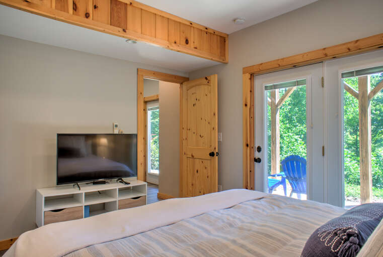 Bedroom Two - Smart TV & Patio Access