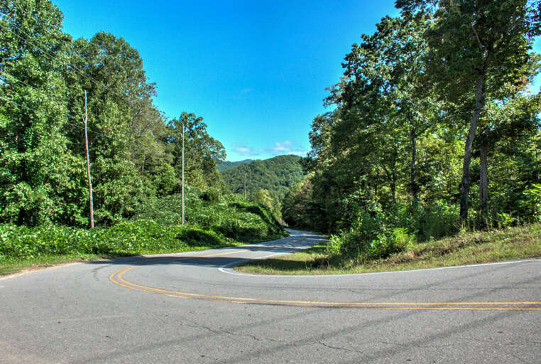 Winding Road to Little Bit Log Cabin